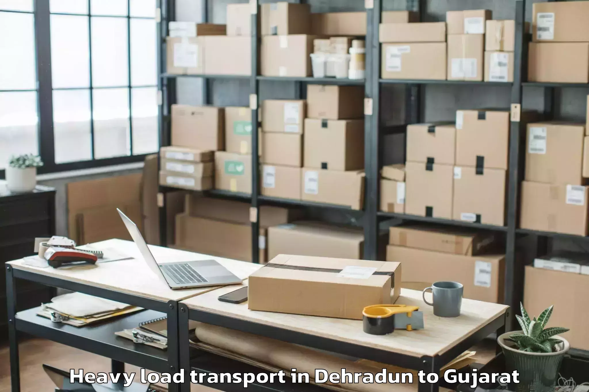 Easy Dehradun to Ambaji Heavy Load Transport Booking